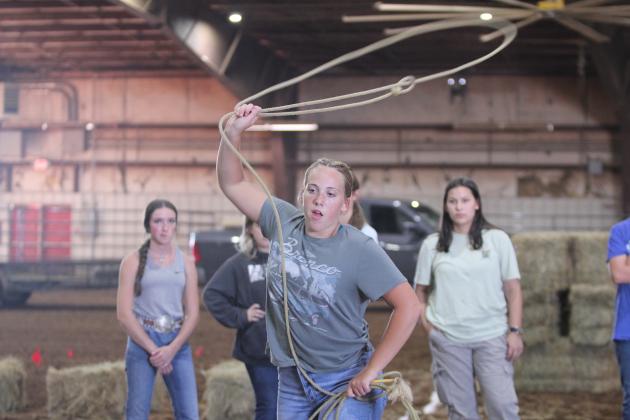 Farmhand Olympics - Bethel sophomore Bailey Murray roping.