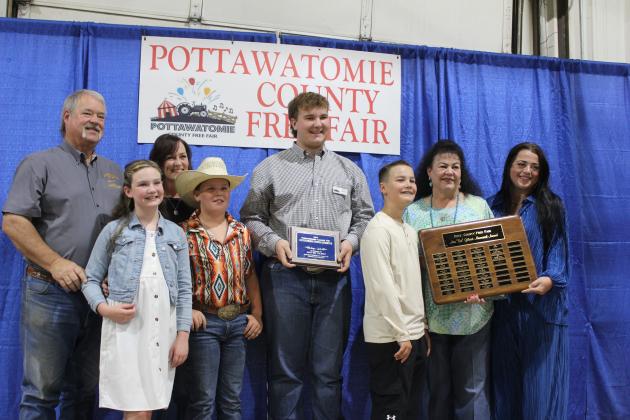 Ann "Sis" Gilbert Memorial Award Recipient Gus Goodson with Gilbert Family