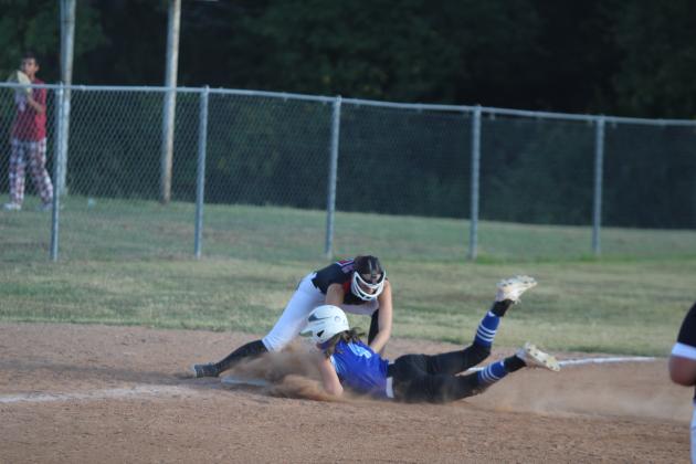 Earlsboro senior Natalie Peters tags out a Depew player who is diving into third base during the home game on Sept. 17. The Lady Wildcats lost, 3-9. Countywide &amp; Sun/Natasha Dunagan