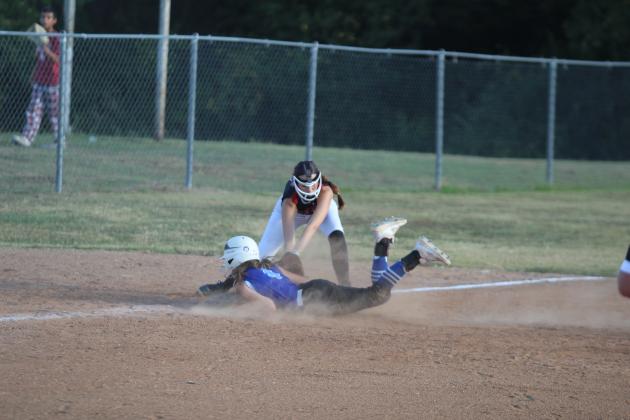 Earlsboro senior Natalie Peters tags out a Depew player who is diving into third base during the home game on Sept. 17. The Lady Wildcats lost, 3-9. Countywide &amp; Sun/Natasha Dunagan