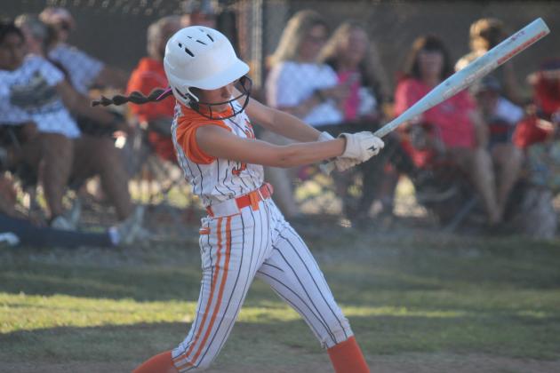 Maud catcher Bridgette Arms hits a double during the Sept. 16 home game with Mill Creek. The Lady Tigers won, 9-6. Countywide &amp; Sun/Natasha Dunagan