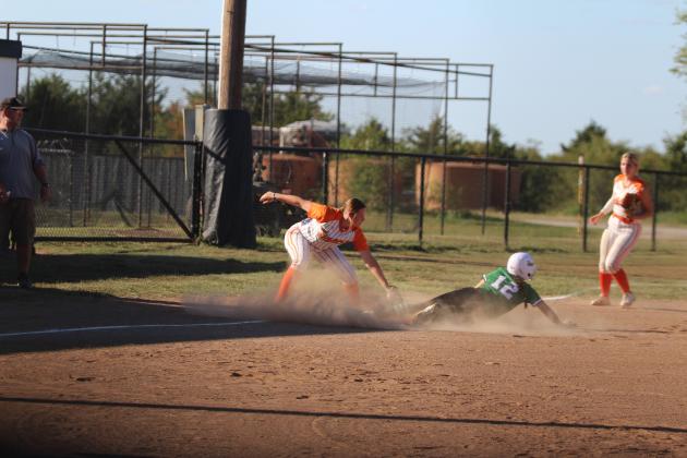 Maud's Jaycee Pack tries to tag a Mill Creek runner sliding into third during the Sept. 16 home game. The Lady Tigers won, 9-6. Countywide &amp; Sun/Natasha Dunagan