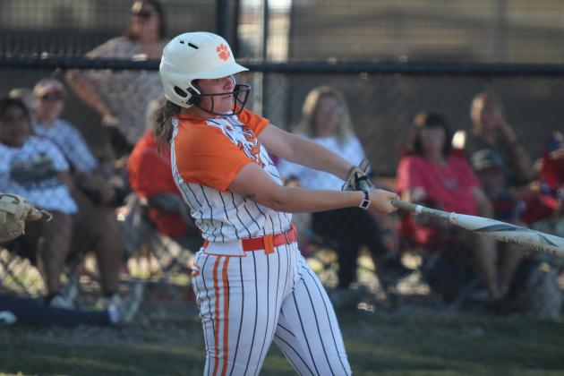 Maud third-baseman Jaycee Pack hits a triple during the Sept. 16 home game with Mill Creek. The Lady Tigers won, 9-6. Countywide &amp; Sun/Natasha Dunagan