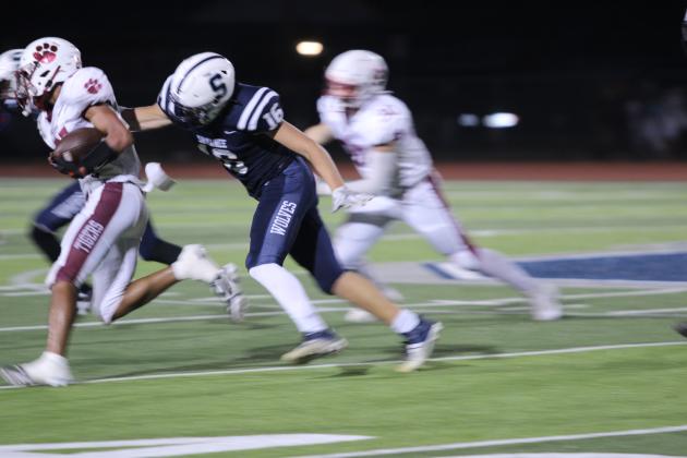 Shawnee junior Jayden Smith tries to bring down the Ardmore ball carrier at the first home game on Sept. 13. Coming back from a loss at Putnam City North (6A) last week, Shawnee (5A) beat Ardmore (4A), 34-13. Countywide &amp; Sun/Natasha Dunagan