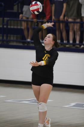 Tecumseh's Channing Goodson serves during the Sept. 17 game at Shawnee High School. The Lady Savages beat the Lady Wolves, 3-0: 25-21, 25-18, and 25-22. Countywide &amp; Sun/Natasha Dunagan