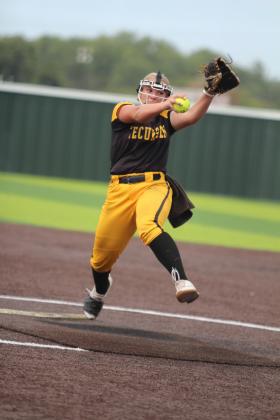 Tecumseh's Embrie Smith winds up during the Dale Fast-Pitch Festival game with Harrah on Sept. 20. Countywide &amp; Sun/Natasha Dunagan
