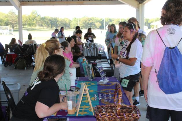 This year, 10 service organizations were invited to set up booths at the House of Hope Third Annual Color Fun Run, which was held at the Citizen Potawatomi Nation Festival Grounds on Oct. 5. Prevention Specialist Kayla Woody said the event raises domestic violence awareness - what it looks like and how to make a change. Countywide &amp; Sun/Natasha Dunagan