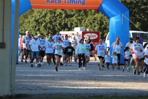 Participants leave the starting line in the House of Hope Third Annual Color Fun Run, held at the Citizen Potawatomi Nation Festival Grounds on Oct. 5. There were 300 people who signed up online, and Prevention Specialist Kayla Woody said they gave away more than 100 T-shirts, so she estimates between 130 to 150 people ages 14 and up actually made the event. Countywide &amp; Sun/Natasha Dunagan