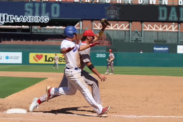 Dale senior Jack Rooker makes the catch at first base just before a Silo runner crosses during the seventh inning of the OSSAA Class 2A State Baseball Championship, held at the Chickasaw Bricktown Ballpark in OKC on Oct. 12. At Yukon High School, the Pirates beat Preston, 6-1, on Oct. 10, and they won with Tushka, 9-6, on Oct. 11, before falling to Silo, 8-3, that day. They end their season with a 27-6 record. Countywide &amp; Sun/Natasha Dunagan