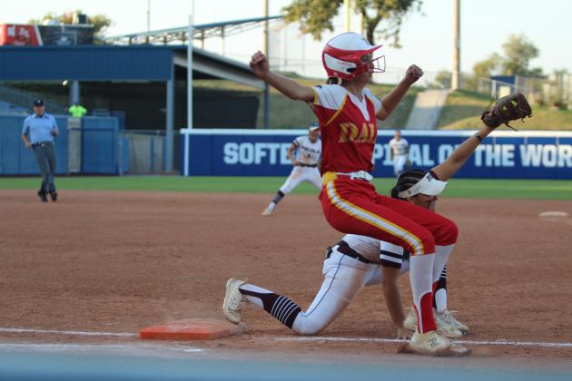 Dale's Holland Herring crosses first base just after the catch during the OSSAA Class 2A Fast-Pitch Softball State Championship against Pocola, held at Devon Park (formerly USA Softball Hall of Fame Stadium) on Oct. 12. The Lady Pirates topped Howe, 10-0, on Oct. 10, and beat Oktaha, 2-0, on Oct. 11, before narrowly claiming victory with Pocola, 1-0. The score was 0-0 until the bottom of the seventh inning when Dale finally got one across home plate. Their record this season is 42-1.