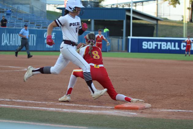 Dale's Holland Herring makes the catch before Pocola's runner makes it to first base in the sixth inning  of the OSSAA Class 2A Fast-Pitch Softball State Championship against Pocola, held at Devon Park (formerly USA Softball Hall of Fame Stadium) on Oct. 12. The Lady Pirates topped Howe, 10-0, on Oct. 10, and beat Oktaha, 2-0, on Oct. 11, before narrowly claiming victory with Pocola, 1-0. The score was 0-0 until the bottom of the seventh inning when Dale finally got one across home plate.