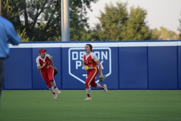 Dale's Daley Lang (#10) roars after making the outfield catch for the third out in the top of the sixth inning of the OSSAA Class 2A Fast-Pitch Softball State Championship against Pocola, held at Devon Park (formerly USA Softball Hall of Fame Stadium) on Oct. 12. The Lady Pirates topped Howe, 10-0, on Oct. 10, and beat Oktaha, 2-0, on Oct. 11, before narrowly claiming victory with Pocola, 1-0. The score was 0-0 until the bottom of the seventh inning when Dale finally got one across home plate.