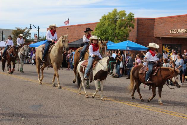 Members of the Tecumseh Round-Up Club ride their horses in the Frontier Days Parade on Sept. 28. They won second in the Club/Organization category, and they held a rodeo that evening. Countywide &amp; Sun/Natasha Dunagan