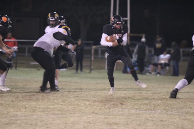 Maud sophomore Ryan Poull catches a pass and runs it in for a touchdown in the homecoming game with Midway on Oct. 17. The Tigers won, 50-0. Countywide &amp; Sun/Natasha Dunagan