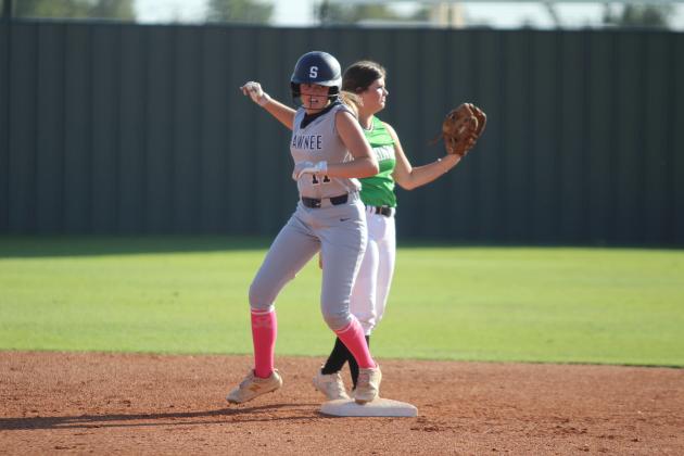 Shawnee third-baseman Corbyn Panther beats the catch to second base after hitting a double in the second inning of the home game with Seminole on Oct. 1. The Lady Wolves Fast-Pitch team won, 12-0. Countywide &amp;  Sun/Natasha Dunagan