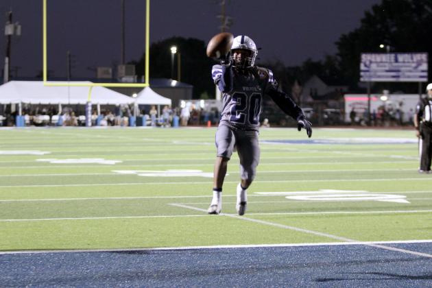 Shawnee senior Deetrick Beavers jumps for joy after making a touchdown in the first quarter of the home game with East Central during Jim Thorpe Night on Sept. 27. The Wolves won, 28-7. Countywide &amp; Sun/Natasha Dunagan