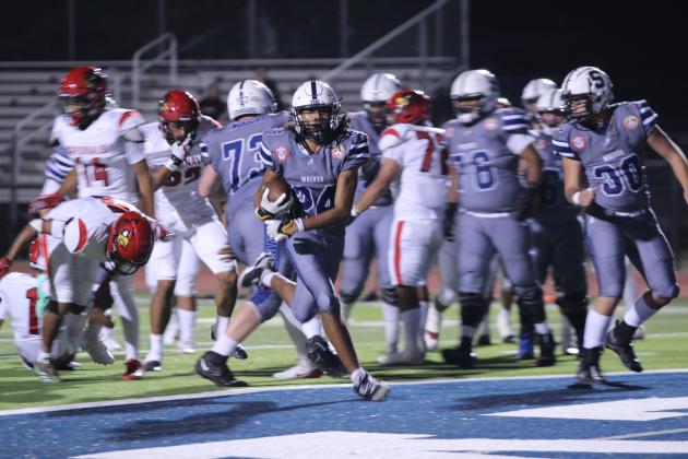 Shawnee senior Dace Shaw runs into the endzone for a touchdown in the second quarter of the home game with East Central during Jim Thorpe Night on Sept. 27. The Wolves won, 28-7. Countywide &amp; Sun/Natasha Dunagan