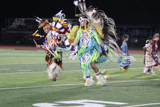 Members of the Wolf Spirit Dancers performed at halftime during Jim Thorpe Night at Shawnee High School, Sept. 27. They included, from left, Fancy Dancer Zayden Foreman (Sac &amp; Fox), Fancy Dancer Xavier Moreno (Pawnee/Otoe), and in background, Jingle Dress Dancers Estella Salazar (Absentee Shawnee Tribe), Peyton Neely (Citizen Potawatomi Nation), and Prestynn Neely (Citizen Potawatomi Nation), said SPS Director of Communications Amanda Johnson. Countywide &amp; Sun/Natasha Dunagan