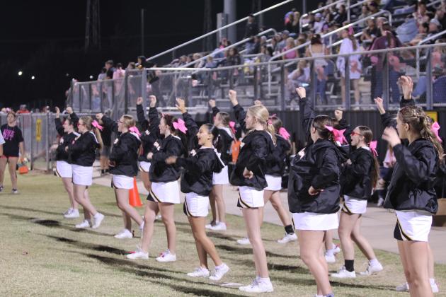 The Tecumseh High School Cheerleaders rally the team during the district home game with Chickasha on Oct. 25. The Savages lost in overtime, 41-47. Countywide &amp; Sun/Natasha Dunagan