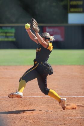 Tecumseh sophomore Embrie Smith vaults the ball toward home in the Oct. 3 game with Stilwell during the Class 4A OSSAA Fast-Pitch Regionals. The Lady Savages won that game, 3-1, and lost the game against Poteau, 2-4, the same day. On Oct. 4, they beat Bristow, 11-2, but lost to Poteau, 5-8. Countywide &amp; Sun/Natasha Dunagan