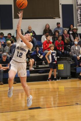 Asher’s Makaylee Herrell steals the ball and adds two more points to the board.