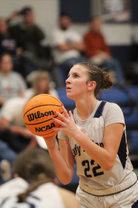 Asher’s Makenah Templeton aims a foul shot during the fourth quarter.