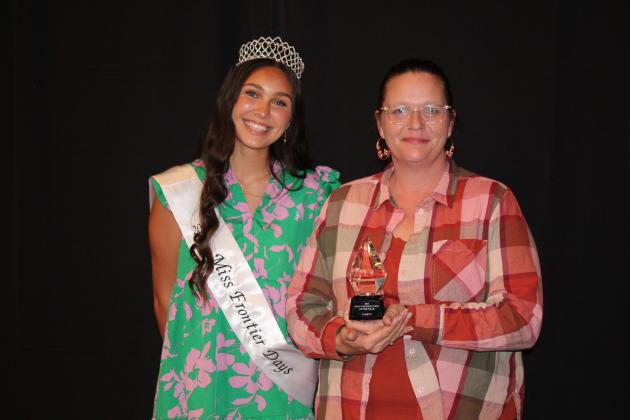 Casey's won the New Construction of the Year Award during the Tecumseh Chamber of Commerce Annual Meeting &amp; Awards Banquet, held at the Grand Casino Hotel and Resort on Nov. 21. Accepting the award is Store Manager Sabrina Brewer, right. Also shown is Miss Frontier Days Jalee Meyers. Countywide &amp; Sun/Natasha Dunagan