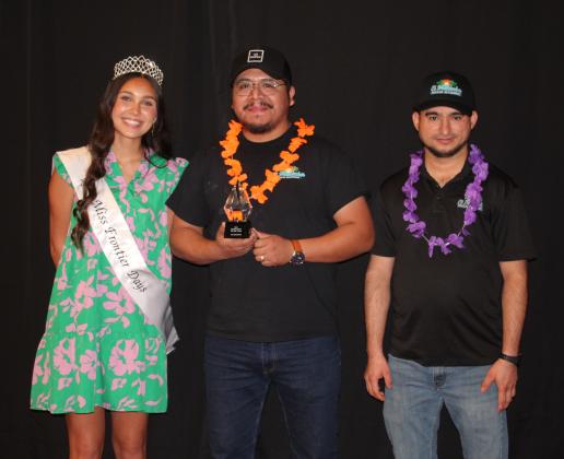 Miss Frontier Days Jalee Meyers poses with Marco Villa and Miguel Ramirez, with El Malecon, who received Business Renovation of the Year during the Tecumseh Chamber of Commerce Annual Meeting &amp; Awards Banquet, held at the Grand Casino Hotel and Resort on Nov. 21. Countywide &amp; Sun/Natasha Dunagan