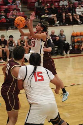 Earlsboro’s Wes Lowe makes his shot and adds two points in the second quarter of the Nov. 19 home game against Ripley. The Wildcats lost, 30-58. Countywide &amp; Sun/Natasha Dunagan