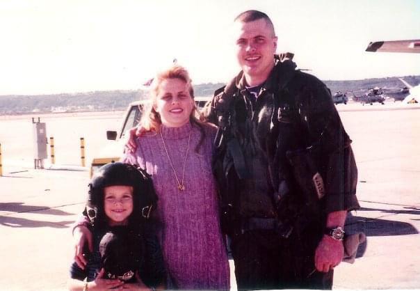 Tecumseh Assistant Police Chief Mike Mallinson poses with his wife, Laurie, and son, Michael Lawrence Mallinson, in 1994 at the Naval Air Station North Island in San Diego, after flying in from Hawaii after a six-month deployment aboard the USS Abraham Lincoln CVN72. Photo provided.