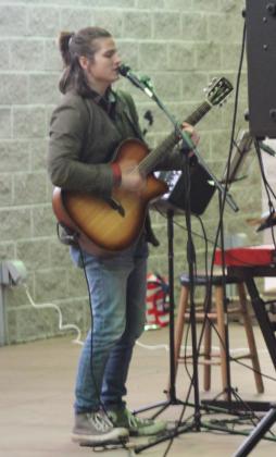 Martin Kamm, of Shawnee, sings Christmas songs during the Carols &amp; Cocoa event held at Woodland Veterans Park on Dec. 19. The IBC Ensemble, Miranda Mulkey, and Dr. Mitch Wolf also performed that evening, and free cocoa was provided by the Shawnee Parks and Recreation employees. Countywide &amp; Sun/Natasha Dunagan