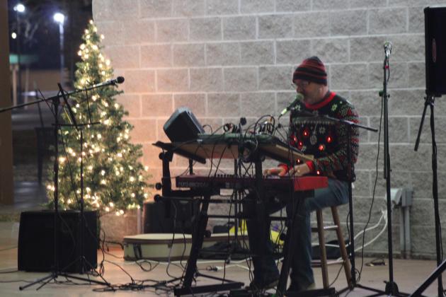 Dr. Mitch Wolf jazzes up some Christmas songs, as he plays keyboard, during the Carols &amp; Cocoa event held at Woodland Veterans Park on Dec. 19. The IBC Ensemble, Miranda Mulkey, and Martin Kamm also performed that evening, and free cocoa was provided by the Shawnee Parks and Recreation employees. Countywide &amp; Sun/Natasha Dunagan