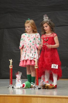 Natalie Mason and Sylvia Butler compete during the Our Diamond Miss Christmas Pageant, held at Will Rogers Elementary on Dec. 7. Butler won Division Supreme in her age group, and Mason won Fashion Queen and Overall Christmas Miss. Countywide &amp; Sun/Natasha Dunagan