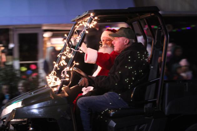 Santa Claus rides in a side-by-side UTV, entered by Tecumseh Pentecostal Church of God, during the Grinchmas Parade in Tecumseh on Dec. 5. Countywide &amp; Sun/Natasha Dunagan