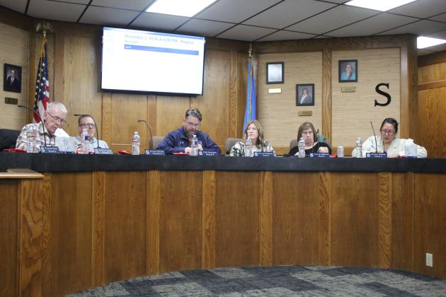 The Shawnee Board of Education meets on Dec. 2. Shown, from left, are Bobby Canty, Russ Oliver, President Clif Harden, Jeanne Swinney, Molly Hillhouse, and Kristen Wilson. (Turner Bass is not pictured, but was present.)