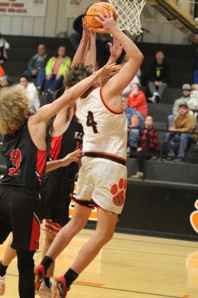 Maud's Bowdee Brooks tries for a bucket and gets fouled during the Dec. 9 home game with Macomb. The Tigers won, 72-64. Countywide &amp; Sun/Natasha Dunagan