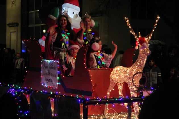 Royalty from the Prague Kolache Festival wave from their sleigh in the Shawnee Parade of Lights on Dec. 13. Countywide &amp; Sun/Natasha Dunagan