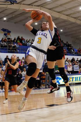 Bethel junior Alexis Tucker is fouled as she goes to the hoop during the Jan. 17 homecoming game with North Rock Creek. The Lady Wildcats lost 42-49. Photo courtesy of Richelle Treece.