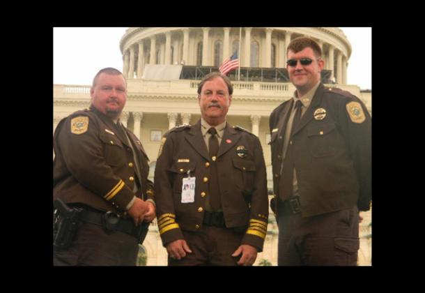 Pottawatomie County Deputy Jimmy Brewer, then-Sheriff Mike Booth, and Deputy Mark Kosemond pose in Washington DC for National Police Week, honoring the fallen heroes from Pottawatomie County and across the nation. Booth recently retired as Sheriff after serving for 16 years. Photo provided.