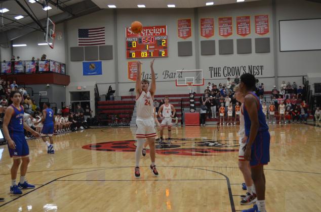 Dale senior Trayden Chambers launches a free throw during the Jan. 17 homecoming game against Millwood. The Pirates won, 64-57. Countywide &amp; Sun/Jessica Jones