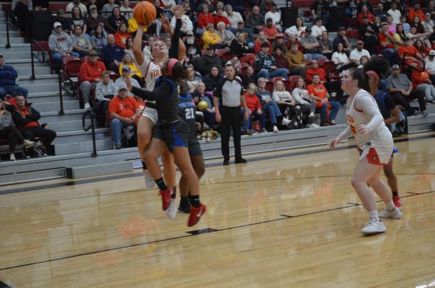 Dale senior Heartly Snyder puts up a shot under pressure during the Jan. 17 homecoming game with Millwood. Snyder was also crowned Homecoming Queen. The Lady Pirates won, 66-37. Countywide &amp; Sun/Jessica Jones