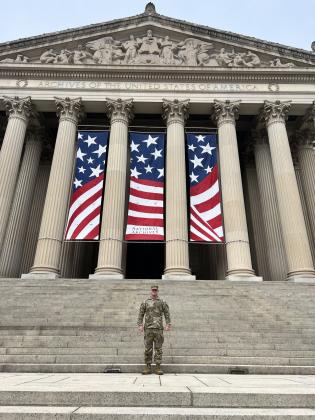 Army National Guardsman Joseph English stands in front of the National Archives in Washington, DC. English served with the 745th Military Police Law &amp; Order detachment during the Presidential Inauguration on Jan. 20. Photo provided by Shawna English.