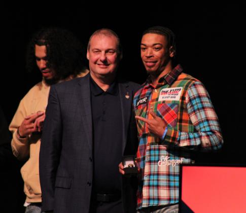 Potawatomi Fire Guard and TBL co-MVP Chuck Guy receives his 2024 TBL National Championship ring from Head Coach Mark Dannhoff during the Banquet &amp; Ring Ceremony at FireLake Arena on Jan. 17. Countywide &amp; Sun/Natasha Dunagan