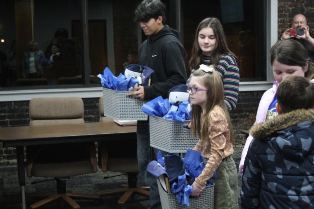 Shawnee students presented the Shawnee Board of Education with gift baskets during the regular Jan. 6 meeting. Countywide &amp; Sun/Natasha Dunagan