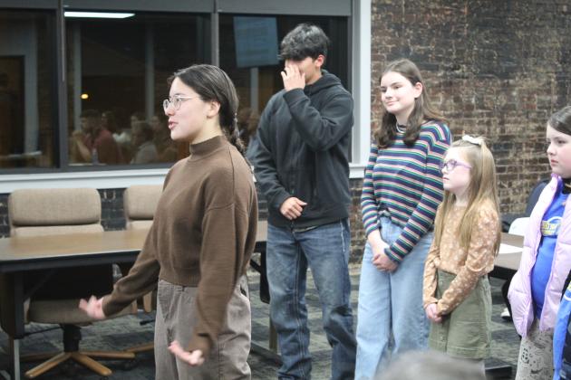 Shawnee High School student, Kimberly Albers, thanks the Shawnee Board of Education during their meeting on Jan. 6. Students from other sites also presented the members with gift baskets for School Board Appreciation Month. Countywide &amp; Sun/Natasha Dunagan