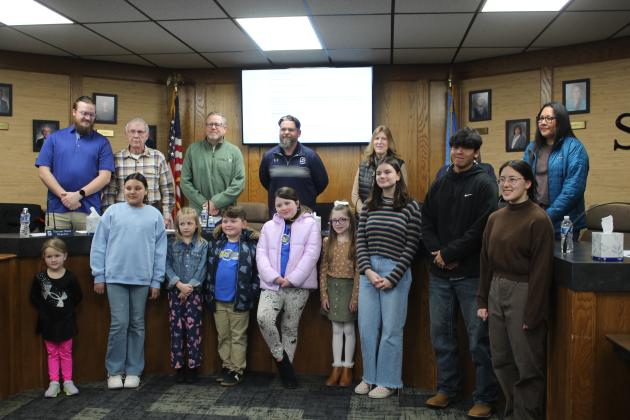 Shawnee students presented the Shawnee Board of Education with gift baskets during the regular Jan. 6 meeting. Countywide &amp; Sun/Natasha Dunagan