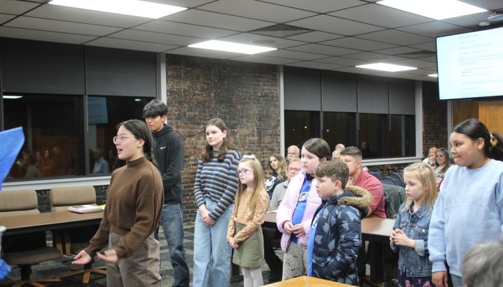 Shawnee High School student, Kimberly Albers, thanks the Shawnee Board of Education during their meeting on Jan. 6. Students from other sites also presented the members with gift baskets for School Board Appreciation Month. Countywide &amp; Sun/Natasha Dunagan