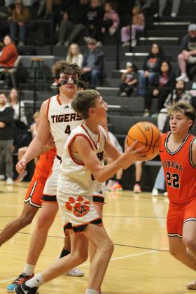Maud junior Carsyn Bodkin steps up to the hoop, as senior Bowdee Brooks holds back a defender, during the Jan. 28 home game with Konawa. Countywide &amp; Sun/Natasha Dunagan