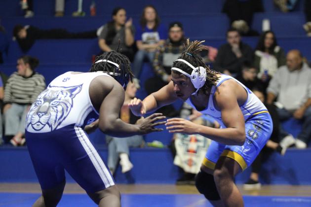 Bethel's Jakeb Miller, right, in the 215 weight class, takes on Kellmontay Sutton from Star Spencer during the dual on Jan. 30. The Wildcats won, 48-24. Countywide &amp; Sun/Natasha Dunagan