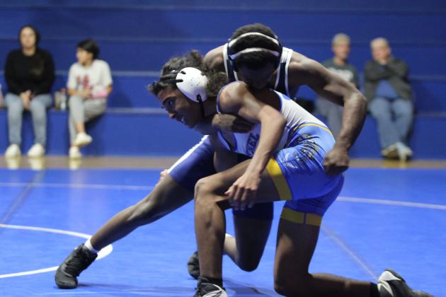 In the 132 weight class, Bethel's Garrison Reed fights to stand up during the dual with Star Spencer on Jan. 30. Since they both had forfeits, Reed took on Michael Jones, who was in the 138 weight class. The Wildcats won, 48-24. Countywide &amp; Sun/Natasha Dunagan